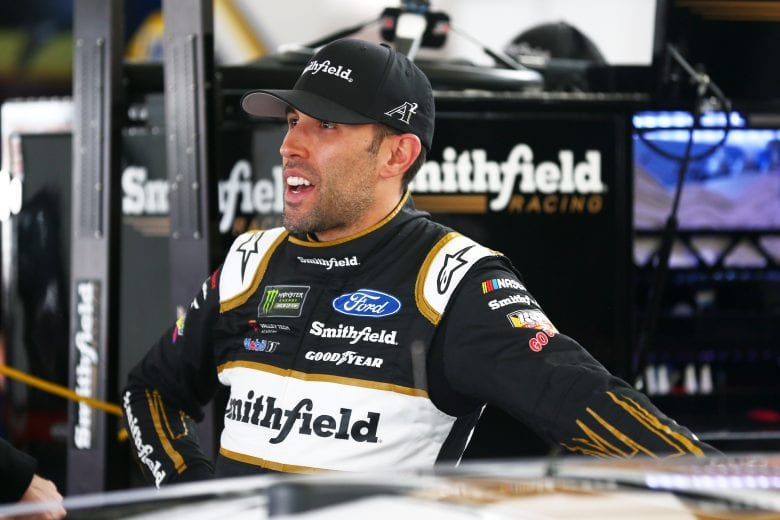 LAS VEGAS, NV - MARCH 01: Aric Almirola, driver of the #10 Smithfield Ford, stands in the garage during practice for the Monster Energy NASCAR Cup Series Pennzoil 400 at Las Vegas Motor Speedway on March 1, 2019 in Las Vegas, Nevada. (Photo by Sarah Crabill/Getty Images) | Getty Images