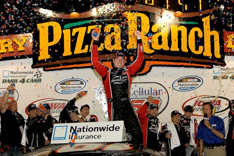 NEWTON, IA - JULY 31: Kyle Busch, driver of the #18 Z-Line Designs Toyota, celebrates in the winner's circle after winning the Nascar Nationawide Series U.S. Cellular 250 at Iowa Speedway on July 31, 2010 in Newton, Iowa. (Photo by Matthew Stockman/Getty Images) | Getty Images