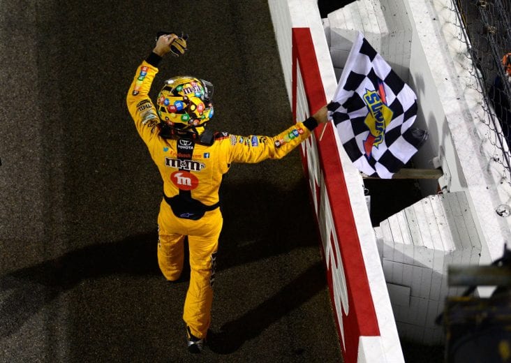 RICHMOND, VA - SEPTEMBER 22: Kyle Busch, driver of the #18 M&M's Toyota, celebrates after winning the Monster Energy NASCAR Cup Series Federated Auto Parts 400 at Richmond Raceway on September 22, 2018 in Richmond, Virginia. (Photo by Robert Laberge/Getty Images) | Getty Images