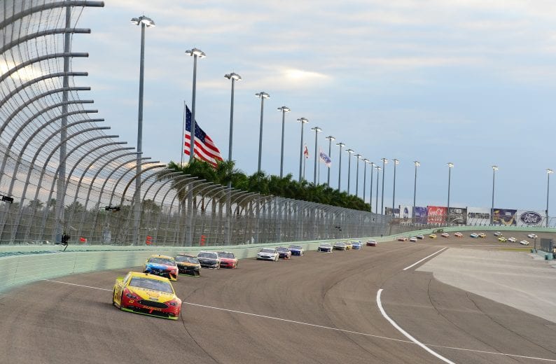 Joey Logano leads the pack on the way to his first NASCAR premier-series championship at Homestead-Miami Speedway in 2018.