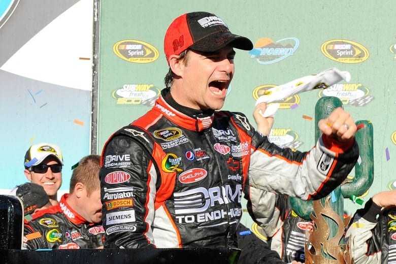AVONDALE, AZ - FEBRUARY 27:  Jeff Gordon, driver of the #24 Drive to End Hunger Chevrolet, celebrates in victory lane after winning the NASCAR Sprint Cup Series Subway Fresh Fit 500 at Phoenix International Raceway on February 27, 2011 in Avondale, Arizona.  (Photo by Jared C. Tilton/Getty Images for NASCAR) | Getty Images