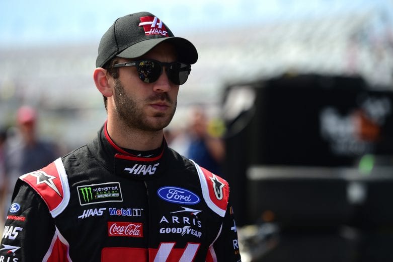 DAYTONA BEACH, FL - FEBRUARY 15:  Daniel Suarez, driver of the #41 Haas Automation Ford, stands in the garage area during practice for the Monster Energy NASCAR Cup Series 61st Annual Daytona 500  at Daytona International Speedway on February 15, 2019 in Daytona Beach, Florida.  (Photo by Jared C. Tilton/Getty Images) | Getty Images
