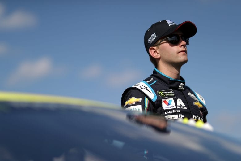 DAYTONA BEACH, FL - FEBRUARY 17: William Byron, driver of the #24 Axalta Chevrolet, stands on the grid prior to the start of the Monster Energy NASCAR Cup Series 61st Annual Daytona 500 at Daytona International Speedway on February 17, 2019 in Daytona Beach, Florida. (Photo by Chris Graythen/Getty Images) | Getty Images