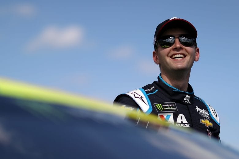 DAYTONA BEACH, FL - FEBRUARY 17:  William Byron, driver of the #24 Axalta Chevrolet, stands on the grid prior to the start of the Monster Energy NASCAR Cup Series 61st Annual Daytona 500 at Daytona International Speedway on February 17, 2019 in Daytona Beach, Florida.  (Photo by Chris Graythen/Getty Images) | Getty Images