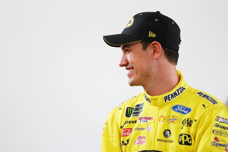 LAS VEGAS, NV - MARCH 01: Joey Logano, driver of the #22 Pennzoil Ford, stands in the garage during practice for the Monster Energy NASCAR Cup Series Pennzoil 400 at Las Vegas Motor Speedway on March 1, 2019 in Las Vegas, Nevada.  (Photo by Sarah Crabill/Getty Images) | Getty Images