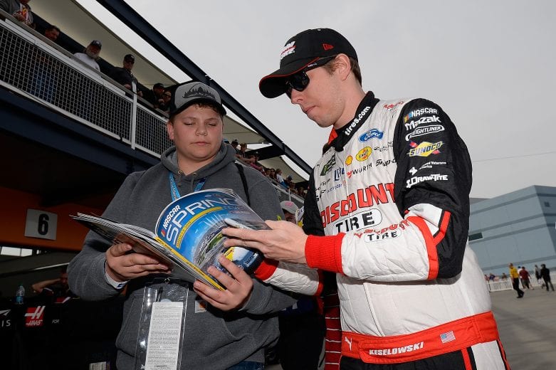 LAS VEGAS, NV - MARCH 01: Brad Keselowski, driver of the #2 Discount Tire Ford, signs an autograph during practice for the Monster Energy NASCAR Cup Series Pennzoil 400 at Las Vegas Motor Speedway on March 1, 2019 in Las Vegas, Nevada.  (Photo by Robert Laberge/Getty Images) | Getty Images