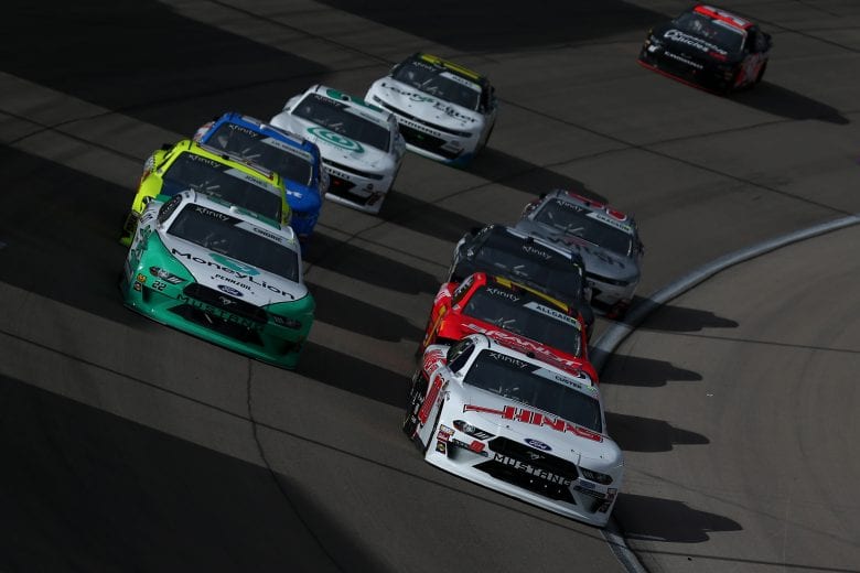LAS VEGAS, NV - MARCH 02: Cole Custer, driver of the #00 Haas Automation Ford, and Austin Cindric, driver of the #22 MoneyLion Ford, lead the field during the NASCAR Xfinty Series Boyd Gaming 300 at Las Vegas Motor Speedway on March 2, 2019 in Las Vegas, Nevada.  (Photo by Sarah Crabill/Getty Images) | Getty Images