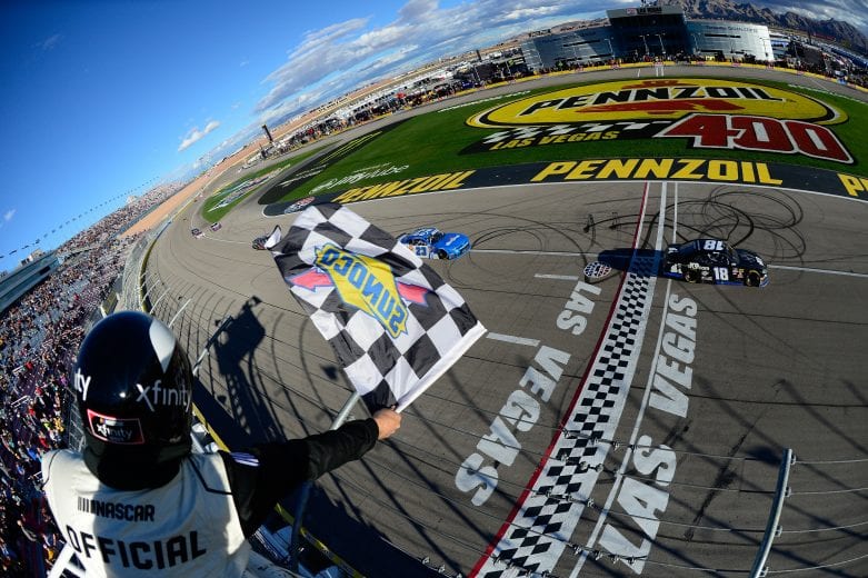 LAS VEGAS, NV - MARCH 02:  Kyle Busch, driver of the #18 Extreme Concepts/iK9 Toyota, crosses the finish line to take the checkered flag and win the NASCAR Xfinty Series Boyd Gaming 300 at Las Vegas Motor Speedway on March 2, 2019 in Las Vegas, Nevada.  (Photo by Robert Laberge/Getty Images) | Getty Images