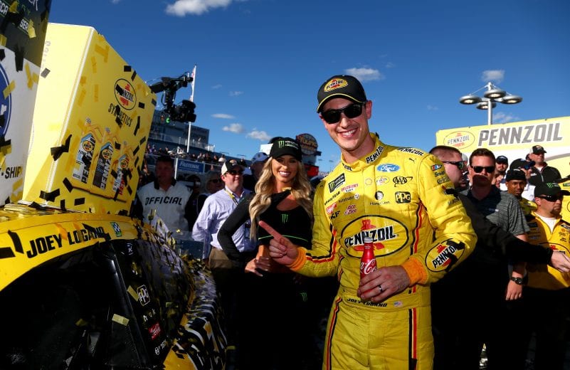 LAS VEGAS, NV - MARCH 03:  Joey Logano, driver of the #22 Pennzoil Ford, poses with the winner sticker  in Victory Lane after winning the Monster Energy NASCAR Cup Series Pennzoil Oil 400 at Las Vegas Motor Speedway on March 3, 2019 in Las Vegas, Nevada.  (Photo by Sarah Crabill/Getty Images) | Getty Images