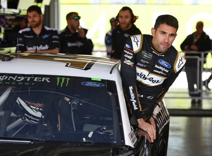 AVONDALE, AZ - MARCH 08:  Aric Almirola, driver of the #10 Smithfield Ford, gets into his car during practice for the Monster Energy NASCAR Cup Series TicketGuardian 500 at ISM Raceway on March 8, 2019 in Avondale, Arizona.  (Photo by Stacy Revere/Getty Images) | Getty Images