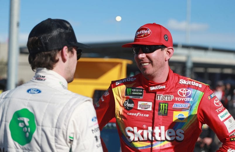 AVONDALE, AZ - MARCH 08:  Kyle Busch, driver of the #18 Skittles Toyota, talks with Ryan Blaney, driver of the #12 MoneyLion Ford, during qualifying for the Monster Energy NASCAR Cup Series TicketGuardian 500 at ISM Raceway on March 8, 2019 in Avondale, Arizona.  (Photo by Matt Sullivan/Getty Images) | Getty Images