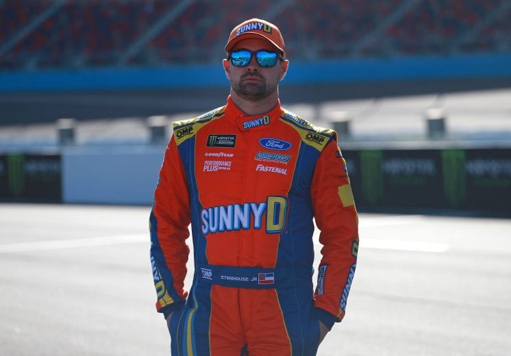 AVONDALE, AZ - MARCH 08: Ricky Stenhouse Jr., driver of the #17 Sunny D Ford, stands by his car during qualifying for the Monster Energy NASCAR Cup Series TicketGuardian 500 at ISM Raceway on March 8, 2019 in Avondale, Arizona. (Photo by Matt Sullivan/Getty Images) | Getty Images