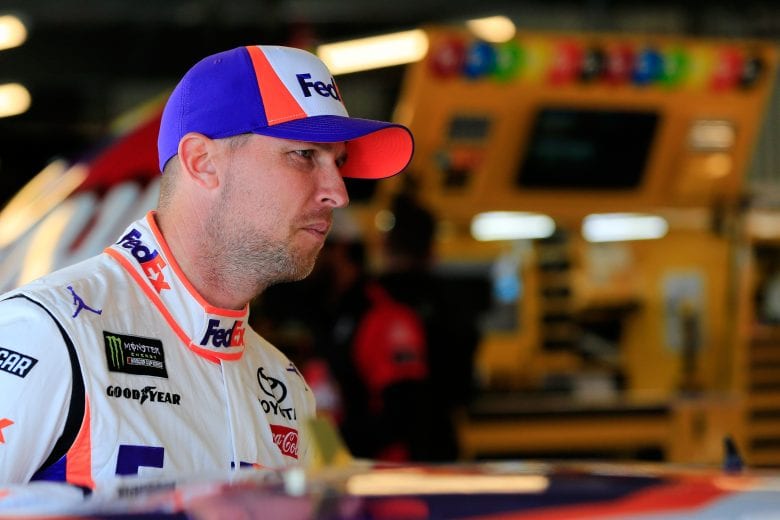 AVONDALE, AZ - MARCH 09: Denny Hamlin, driver of the #11 FedEx Freight Toyota, stands in the garage area during practice for the Monster Energy NASCAR Cup Series TicketGuardian 500 at ISM Raceway on March 9, 2019 in Avondale, Arizona. (Photo by Daniel Shirey/Getty Images) | Getty Images
