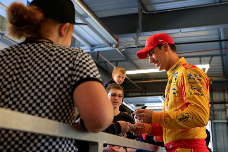AVONDALE, AZ - MARCH 09: Joey Logano, driver of the #22 Shell Pennzoil Ford, signs autographs for fans during practice for the Monster Energy NASCAR Cup Series TicketGuardian 500 at ISM Raceway on March 9, 2019 in Avondale, Arizona. (Photo by Daniel Shirey/Getty Images) | Getty Images
