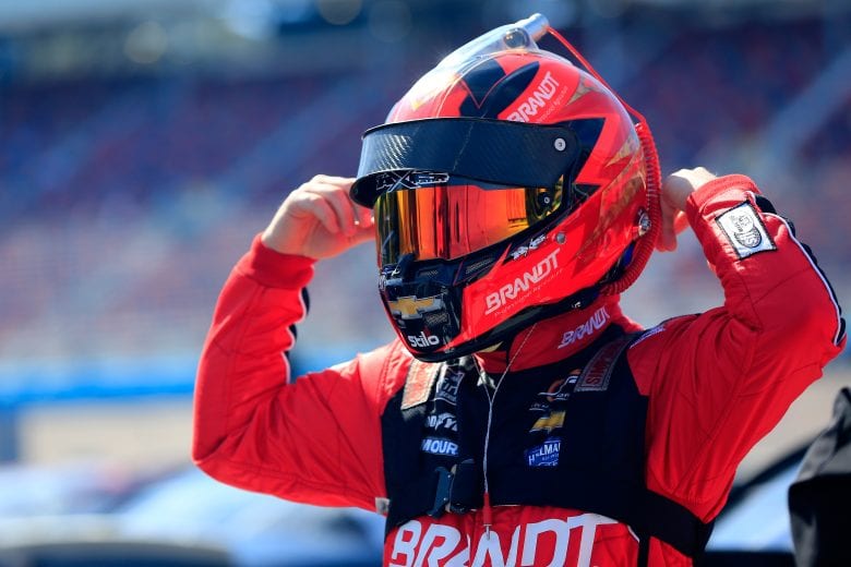 AVONDALE, AZ - MARCH 09:  Justin Allgaier, driver of the #7 BRANDT Professional Agriculture Chevrolet, stands on the grid during qualifying for the NASCAR XFINITY Series iK9 Service Dog 200 at ISM Raceway on March 9, 2019 in Avondale, Arizona.  (Photo by Daniel Shirey/Getty Images) | Getty Images
