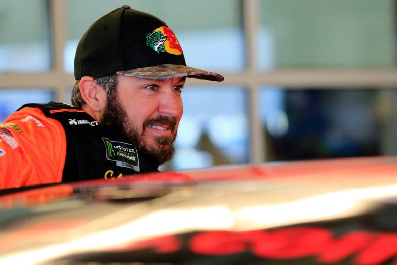 AVONDALE, AZ - MARCH 09: Martin Truex Jr., driver of the #19 Bass Pro Shops Toyota, climbs into his car during practice for the Monster Energy NASCAR Cup Series TicketGuardian 500 at ISM Raceway on March 9, 2019 in Avondale, Arizona. (Photo by Daniel Shirey/Getty Images) | Getty Images