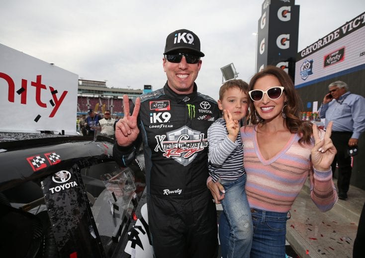 AVONDALE, AZ - MARCH 09:  Kyle Busch, driver of the #18 Extreme Concepts/iK9 Toyota, celebrates with his wife, Samantha, and son, Brexton, after winning the NASCAR Xfinity Series iK9 Service Dog 200 at ISM Raceway on March 9, 2019 in Avondale, Arizona.  (Photo by Matt Sullivan/Getty Images) | Getty Images