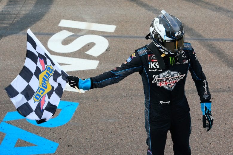 AVONDALE, AZ - MARCH 09:  Kyle Busch, driver of the #18 Extreme Concepts/iK9 Toyota, celebrates with the checkered flag after winning the NASCAR Xfinity Series iK9 Service Dog 200 at ISM Raceway on March 9, 2019 in Avondale, Arizona.  (Photo by Daniel Shirey/Getty Images) | Getty Images