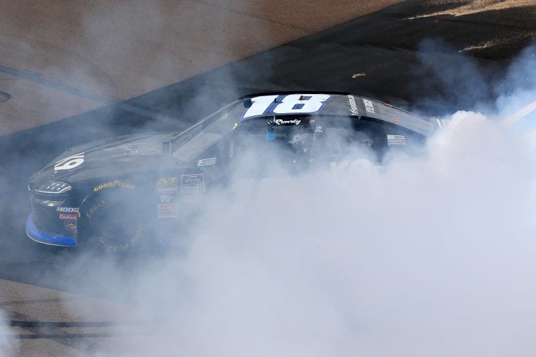 AVONDALE, AZ - MARCH 09:  Kyle Busch, driver of the #18 Extreme Concepts/iK9 Toyota, celebrates with a burnout after winning the NASCAR Xfinity Series iK9 Service Dog 200 at ISM Raceway on March 9, 2019 in Avondale, Arizona.  (Photo by Daniel Shirey/Getty Images) | Getty Images