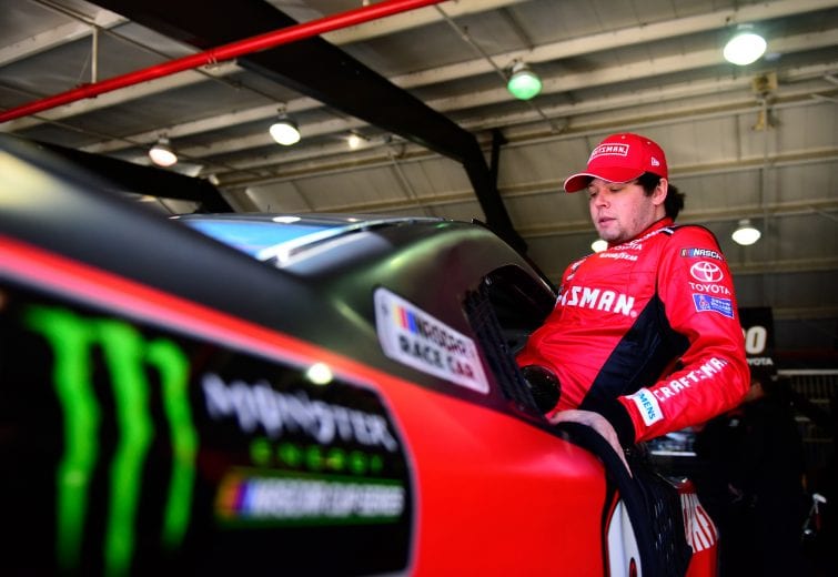 FONTANA, CA - MARCH 15: Erik Jones, driver of the #20 Craftsman Toyota, climbs into his car during practice for the Monster Energy NASCAR Cup Series Auto Club 400 at Auto Club Speedway on March 15, 2019 in Fontana, California. (Photo by Jared C. Tilton/Getty Images) | Getty Images