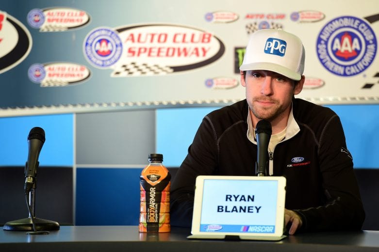 FONTANA, CA - MARCH 15: Ryan Blaney, driver of the #12 PPG Ford, speaks with the media following practice for the Monster Energy NASCAR Cup Series Auto Club 400 at Auto Club Speedway on March 15, 2019 in Fontana, California. (Photo by Jared C. Tilton/Getty Images) | Getty Images