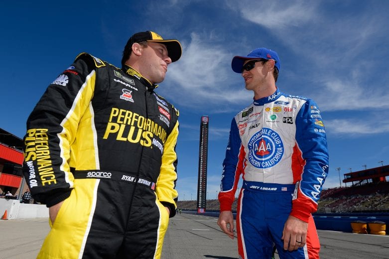 FONTANA, CA - MARCH 15: Ryan Newman, driver of the #6 Performance Plus Motor Oil Ford, talks to Joey Logano, driver of the #22 AAA Southern California Ford, during qualifying for the Monster Energy NASCAR Cup Series Auto Club 400 at Auto Club Speedway on March 15, 2019 in Fontana, California. (Photo by Robert Laberge/Getty Images) | Getty Images