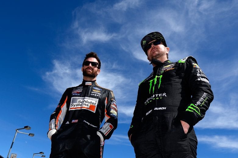 FONTANA, CA - MARCH 15: Corey LaJoie, driver of the #32 Hartford Gold Group Ford, talks to Kurt Busch, driver of the #1 Monster Energy Chevrolet, during qualifying for the Monster Energy NASCAR Cup Series Auto Club 400 at Auto Club Speedway on March 15, 2019 in Fontana, California. (Photo by Robert Laberge/Getty Images) | Getty Images