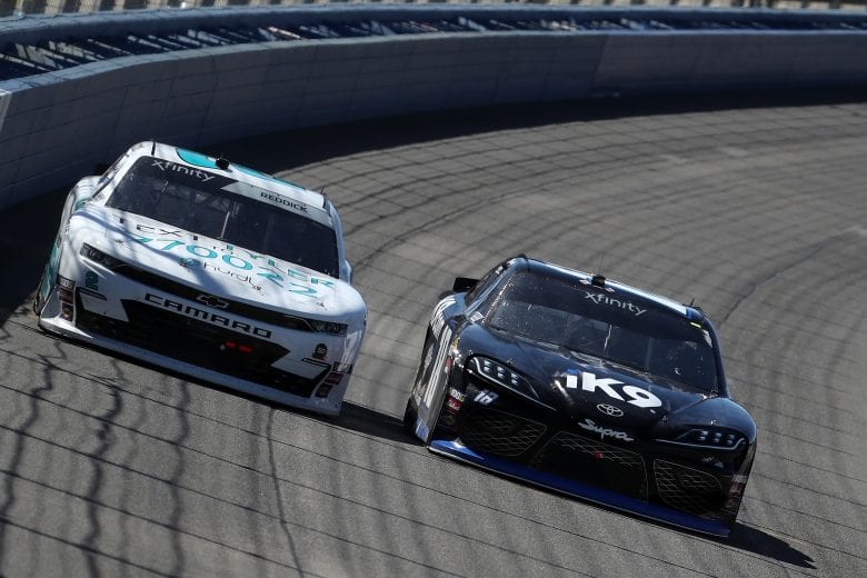FONTANA, CA - MARCH 16: Kyle Busch, driver of the #18 iK9 Toyota, leads during the NASCAR Xfinity Series Production Alliance Group 300 at Auto Club Speedway on March 16, 2019 in Fontana, California. (Photo by Chris Graythen/Getty Images) | Getty Images