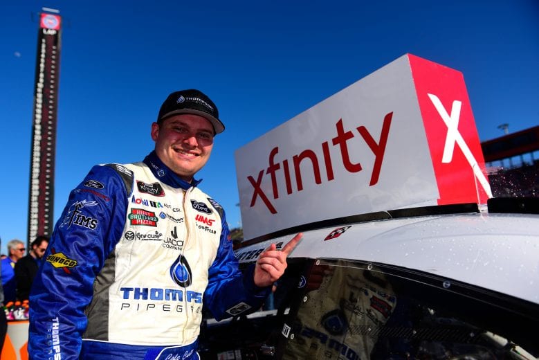 FONTANA, CA - MARCH 16: Cole Custer, driver of the #00 Thompson Pipe/Haas CNC Ford, celebrates in Victory Lane after putting the Winner's Sticker on his car during the NASCAR Xfinity Series Production Alliance Group 300 at Auto Club Speedway on March 16, 2019 in Fontana, California. (Photo by Jared C. Tilton/Getty Images) | Getty Images