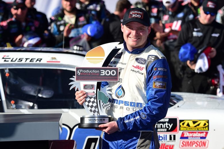 FONTANA, CA - MARCH 16: Cole Custer, driver of the #00 Thompson Pipe/Haas CNC Ford, poses with the trophy in Victory Lane after winning the NASCAR Xfinity Series Production Alliance Group 300 at Auto Club Speedway on March 16, 2019 in Fontana, California. (Photo by Jared C. Tilton/Getty Images) | Getty Images