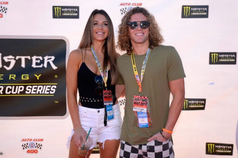 FONTANA, CA - MARCH 17: Angela Rummans and Tyler Crispen attend the driver's meeting prior to the Monster Energy NASCAR Cup Series Auto Club 400 at Auto Club Speedway on March 17, 2019 in Fontana, California. (Photo by Robert Laberge/Getty Images) | Getty Images