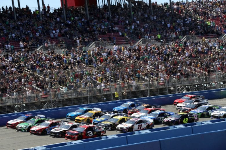FONTANA, CA - MARCH 17: Cars drive five wide prior to the Monster Energy NASCAR Cup Series Auto Club 400 at Auto Club Speedway on March 17, 2019 in Fontana, California. (Photo by Chris Graythen/Getty Images) | Getty Images