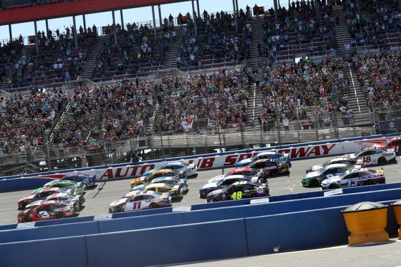FONTANA, CA - MARCH 17: Cars drive five wide prior to the Monster Energy NASCAR Cup Series Auto Club 400 at Auto Club Speedway on March 17, 2019 in Fontana, California. (Photo by Chris Graythen/Getty Images) | Getty Images