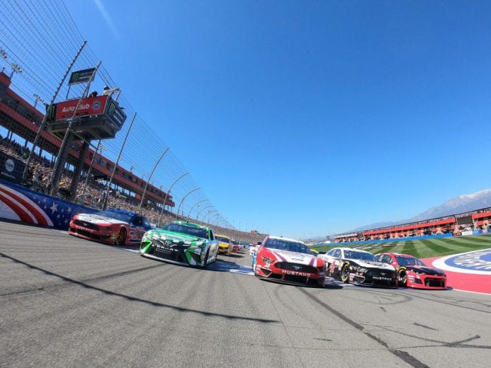 FONTANA, CA - MARCH 17: Cars drive five wide prior to the Monster Energy NASCAR Cup Series Auto Club 400 at Auto Club Speedway on March 17, 2019 in Fontana, California. (Photo by Chris Graythen/Getty Images) | Getty Images