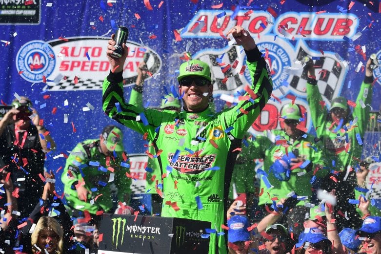 FONTANA, CA - MARCH 17: Kyle Busch, driver of the #18 Interstate Batteries Toyota, celebrates in victory lane after winning the Monster Energy NASCAR Cup Series Auto Club 400 and winning his 200th NASCAR race at Auto Club Speedway on March 17, 2019 in Fontana, California. (Photo by Jared C. Tilton/Getty Images) | Getty Images