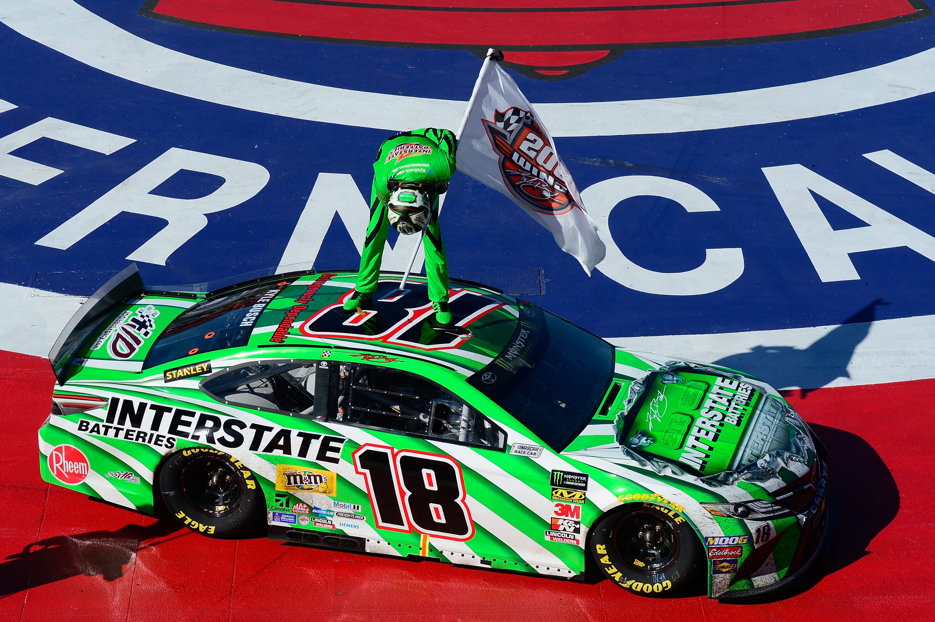 FONTANA, CA - MARCH 17:  Kyle Busch, driver of the #18 Interstate Batteries Toyota,  celebrates winning the Monster Energy NASCAR Cup Series Auto Club 400 and winning his 200th NASCAR win at Auto Club Speedway on March 17, 2019 in Fontana, California.  (Photo by Robert Laberge/Getty Images) | Getty Images