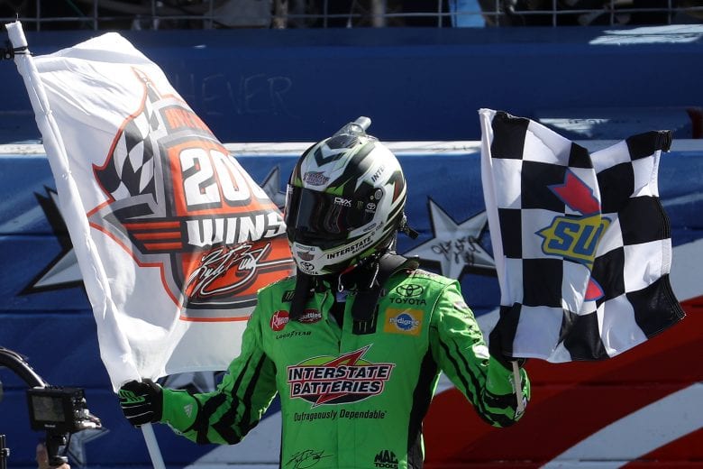 FONTANA, CA - MARCH 17: Kyle Busch, driver of the #18 Interstate Batteries Toyota, celebrates after winning the Monster Energy NASCAR Cup Series Auto Club 400 and winning his 200th NASCAR race at Auto Club Speedway on March 17, 2019 in Fontana, California. (Photo by Chris Graythen/Getty Images) | Getty Images
