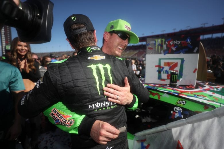 FONTANA, CA - MARCH 17: Kyle Busch, driver of the #18 Interstate Batteries Toyota, is congratulated by his brother Kurt Busch, driver of the #1 Monster Energy Chevrolet, after winning the Monster Energy NASCAR Cup Series Auto Club 400 and winning his 200th NASCAR race at Auto Club Speedway on March 17, 2019 in Fontana, California. (Photo by Chris Graythen/Getty Images) | Getty Images