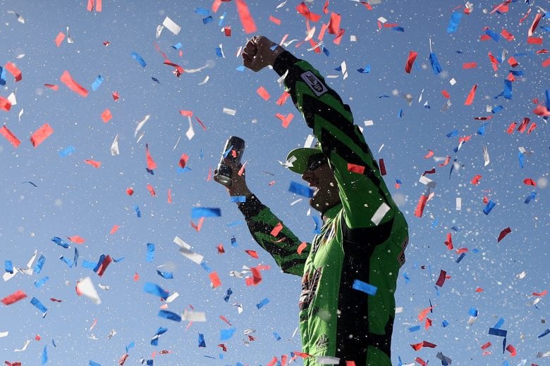 FONTANA, CA - MARCH 17: Kyle Busch, driver of the #18 Interstate Batteries Toyota, celebrates in victory lane after winning the Monster Energy NASCAR Cup Series Auto Club 400 and winning his 200th NASCAR race at Auto Club Speedway on March 17, 2019 in Fontana, California. (Photo by Chris Graythen/Getty Images) | Getty Images