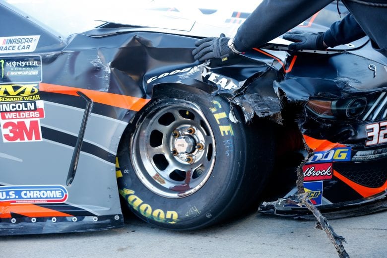 MARTINSVILLE, VA - MARCH 23:  Damage is seen on the car of Corey LaJoie, driver of the #32 CorvetteParts.net Ford, during practice for the Monster Energy NASCAR Cup Series STP 500 at Martinsville Speedway on March 23, 2019 in Martinsville, Virginia.  (Photo by Brian Lawdermilk/Getty Images) | Getty Images