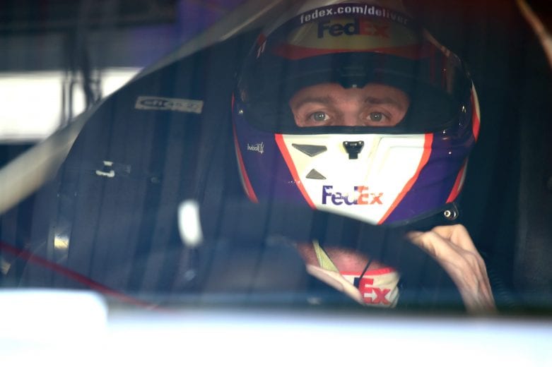 MARTINSVILLE, VA - MARCH 23:  Denny Hamlin, driver of the #11 FedEx Ground Toyota, sits in his car during practice for the Monster Energy NASCAR Cup Series STP 500 at Martinsville Speedway on March 23, 2019 in Martinsville, Virginia.  (Photo by Jared C. Tilton/Getty Images) | Getty Images