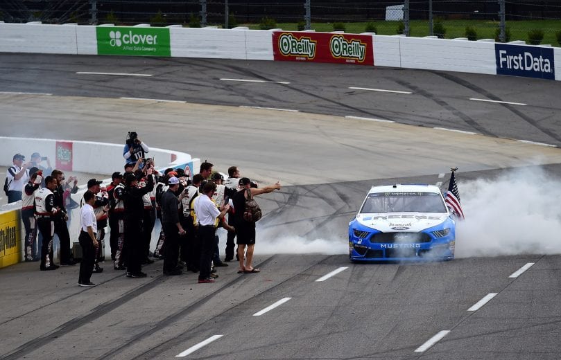 MARTINSVILLE, VA - MARCH 24:  Brad Keselowski, driver of the #2 Reese/Draw Tite Ford, celebrates with a burnout after winning the Monster Energy NASCAR Cup Series STP 500 at Martinsville Speedway on March 24, 2019 in Martinsville, Virginia.  (Photo by Jared C. Tilton/Getty Images) | Getty Images