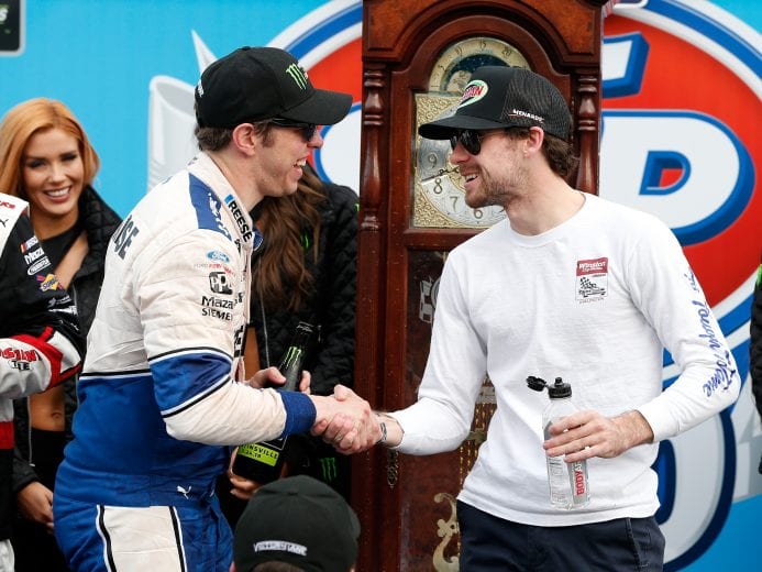 MARTINSVILLE, VA - MARCH 24:  Brad Keselowski, driver of the #2 Reese/Draw Tite Ford, is congratulated by teammate, Ryan Blaney, driver of the #12 Menards/Libman Ford, in victory lane after winning the Monster Energy NASCAR Cup Series STP 500 at Martinsville Speedway on March 24, 2019 in Martinsville, Virginia.  (Photo by Brian Lawdermilk/Getty Images) | Getty Images