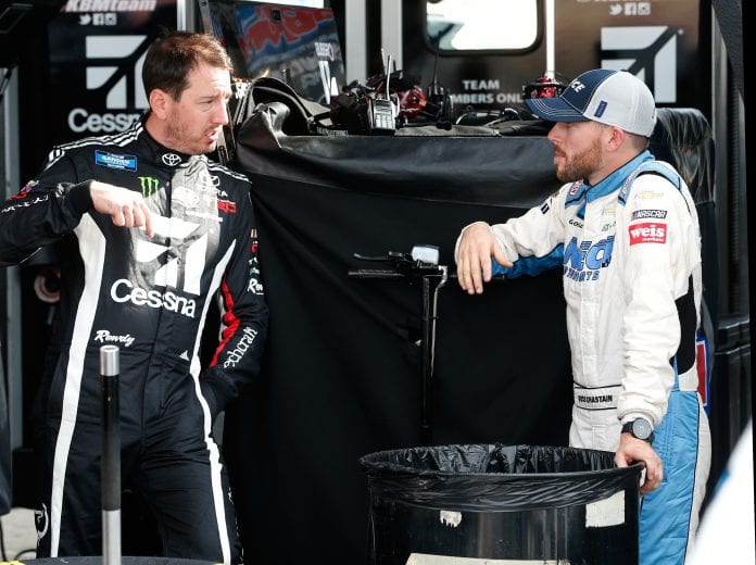 FORT WORTH, TX - MARCH 28: Kyle Busch, driver of the #51 Cessna Toyota, talks with, Ross Chastain, driver of the #45 TruNorth.Paul Jr Designs Chevrolet, during practice for the NASCAR Gander Outdoor Truck Series Vankor 350 at Texas Motor Speedway on March 28, 2019 in Fort Worth, Texas. (Photo by Brian Lawdermilk/Getty Images) | Getty Images