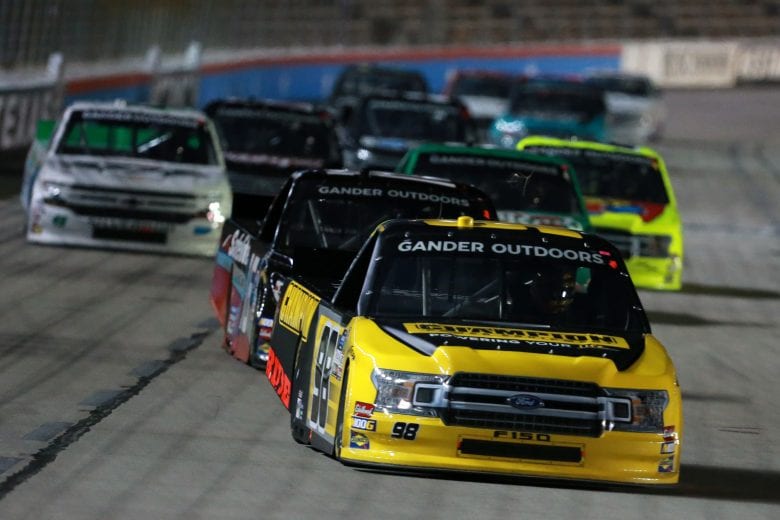 FORT WORTH, TX - MARCH 29: Grant Enfinger, driver of the #98 Champion Power Equipment/Curb Records Ford, leads a pack of cars during the NASCAR Gander Outdoors Truck Series Vankor 350 at Texas Motor Speedway on March 29, 2019 in Fort Worth, Texas. (Photo by Sean Gardner/Getty Images) | Getty Images