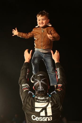 FORT WORTH, TX - MARCH 29: Kyle Busch, driver of the #51 Cessna Toyota, celebrates withi his son Brexton after winning the NASCAR Gander Outdoors Truck Series Vankor 350 at Texas Motor Speedway on March 29, 2019 in Fort Worth, Texas. (Photo by Chris Graythen/Getty Images) | Getty Images