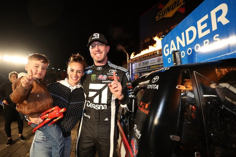 FORT WORTH, TX - MARCH 29: Kyle Busch, driver of the #51 Cessna Toyota, celebrates with his son Brexton and his wife Samantha by placing the Winner's sticker on his car in Victory Lane after winning the NASCAR Gander Outdoors Truck Series Vankor 350 at Texas Motor Speedway on March 29, 2019 in Fort Worth, Texas. (Photo by Chris Graythen/Getty Images) | Getty Images