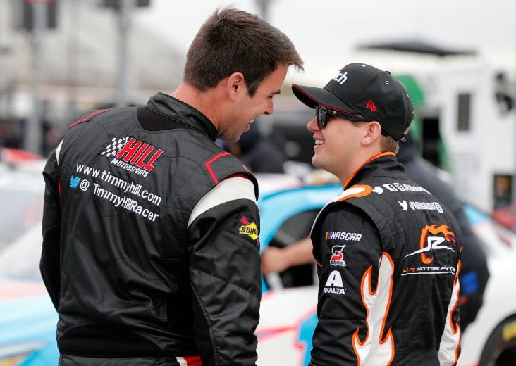 FORT WORTH, TX - MARCH 30: Timmy Hill, driver of the #13 Street Toys/LasVegas.net Toyota, talks with, Noah Gragson, driver of the #9 Switch Chevrolet, during qualifying for the NASCAR Xfinity Series My Bariatric Solutions 300 at Texas Motor Speedway on March 30, 2019 in Fort Worth, Texas. (Photo by Brian Lawdermilk/Getty Images) | Getty Images