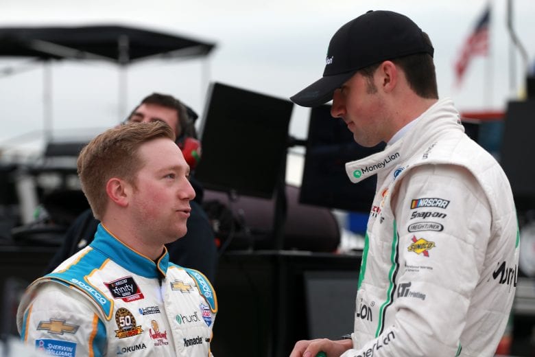 FORT WORTH, TX - MARCH 30: Tyler Reddick, driver of the #2 Nationwide Children's Hospital Chevrolet, talks with Austin Cindric, driver of the #22 MoneyLion Ford, during qualifying for the NASCAR Xfinity Series My Bariatric Solutions 300 at Texas Motor Speedway on March 30, 2019 in Fort Worth, Texas. (Photo by Matt Sullivan/Getty Images) | Getty Images