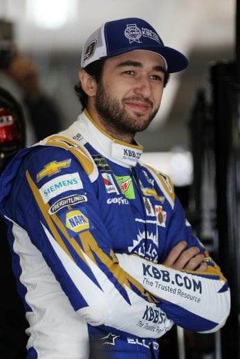 FORT WORTH, TX - MARCH 30:  Chase Elliott, driver of the #S9 Kelley Blue Book Chevrolet, stands in the garage area during practice for the Monster Energy NASCAR Cup Series O'Reilly Auto Parts 500 at Texas Motor Speedway on March 30, 2019 in Fort Worth, Texas.  (Photo by Chris Graythen/Getty Images) | Getty Images